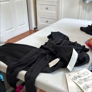 Black Carol Ware Patel. Ties in front see options